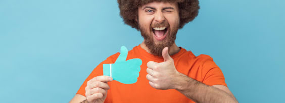 a mna holding a paper Facebook upvote icon