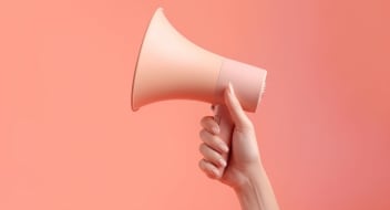 Illustration of hand holding megaphone, marketing and sales cone
