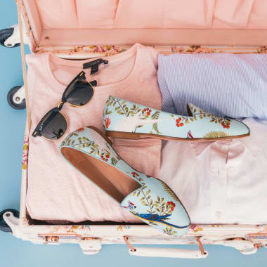Pink suitcase ready for vacation