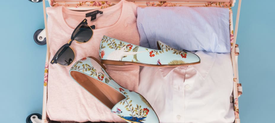 Pink suitcase ready for vacation