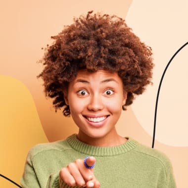 a young lady pointing at you