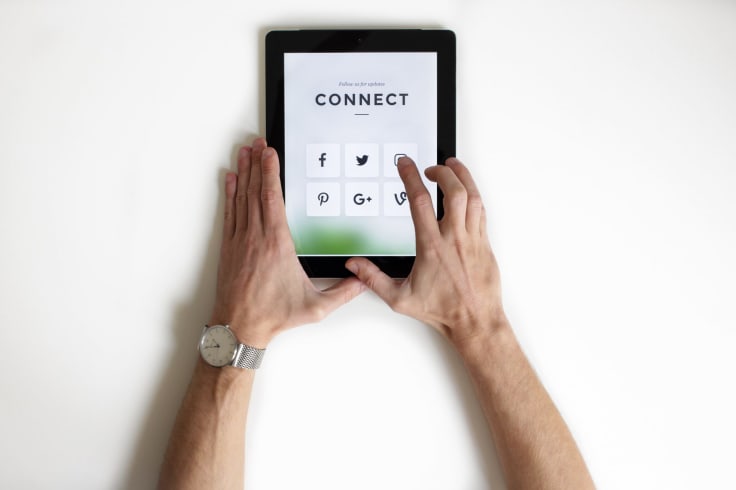 social media icons on a tablet