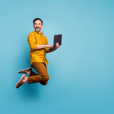 a jumping man with a computer on a blue background