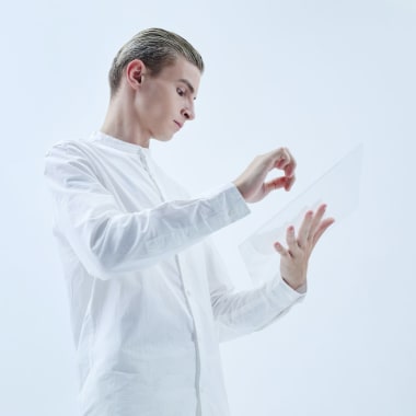 a-man-with-a-glass-tablet